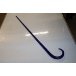 A blue glass walking stick