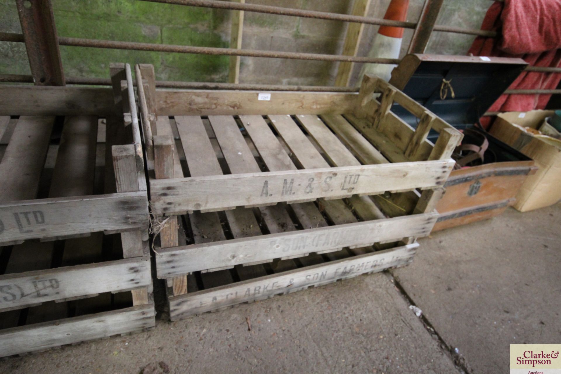 Three wooden apple crates