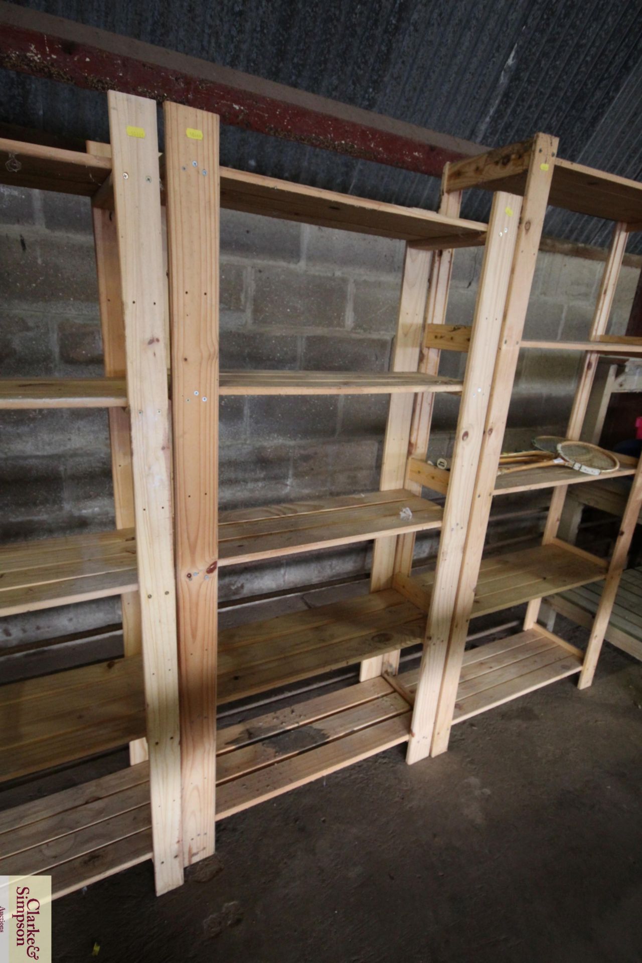 A five tier wooden shelving unit