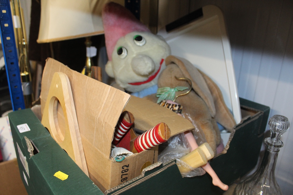 A box of vintage items including soft toys; table