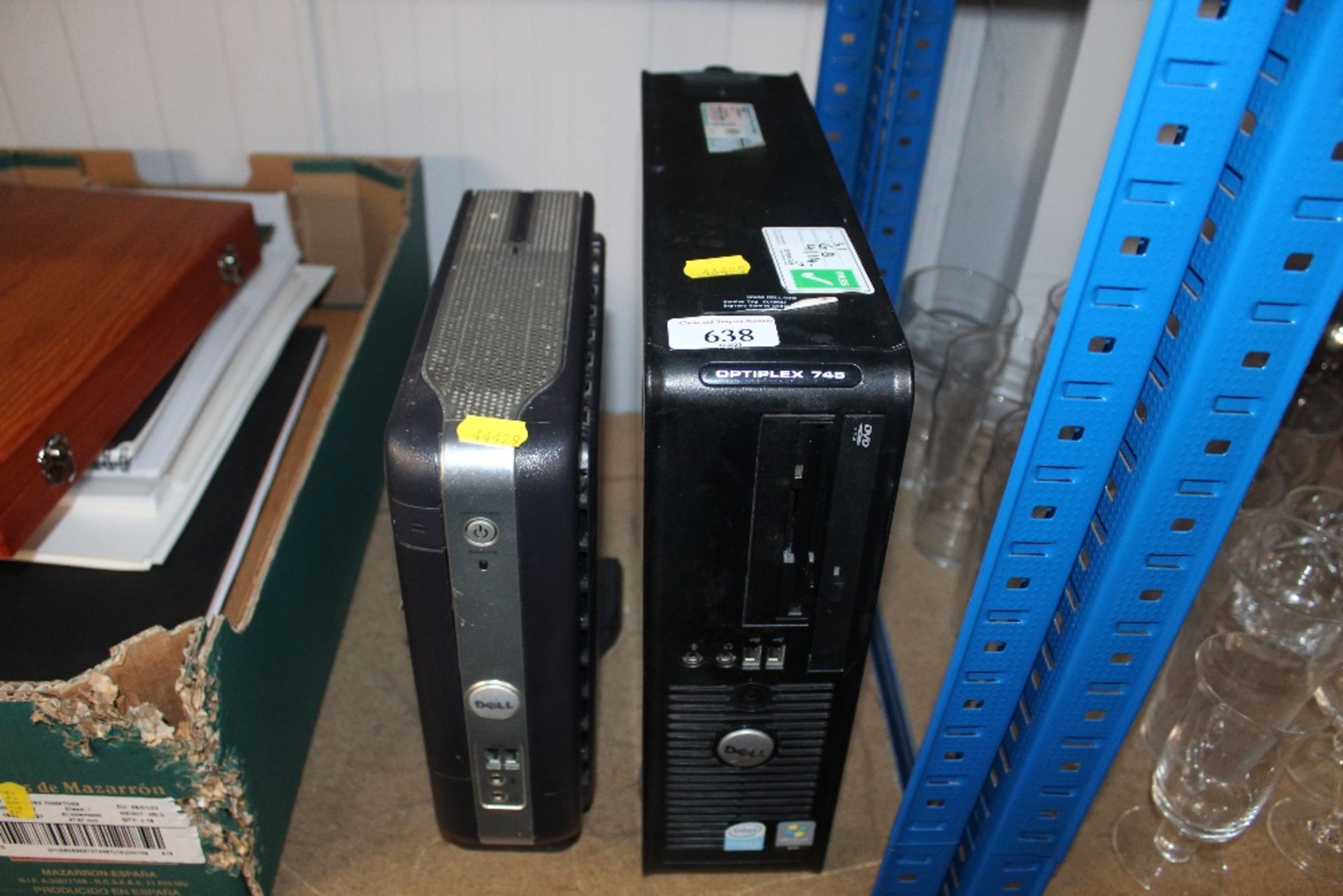 Two Dell computers, sold as seen, lacking leads