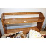 An oak two tier shelf