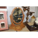 A swing framed dressing table mirror