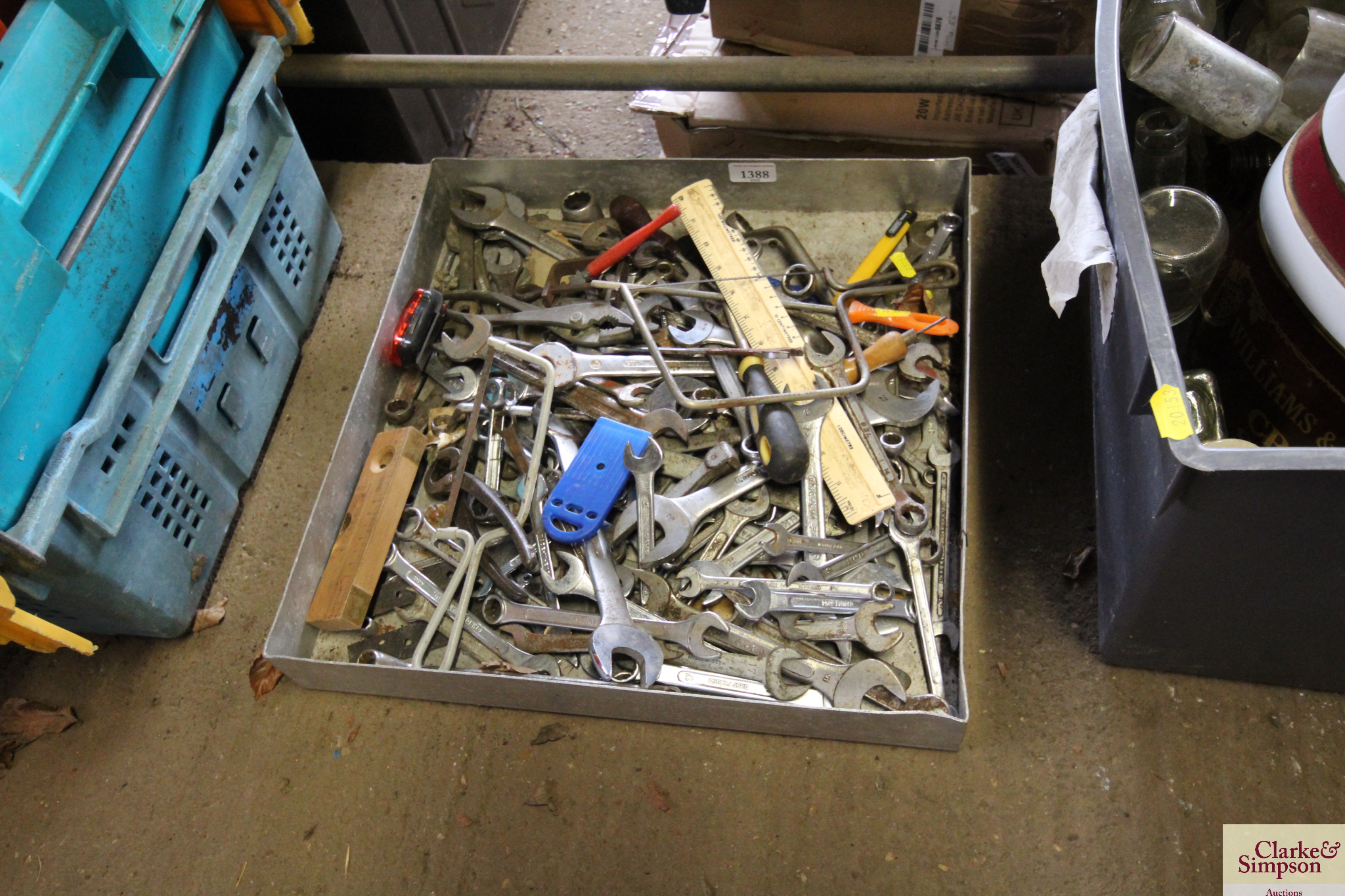 A metal tray and contents of various sized spanner