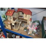 A Sylvanian family model house and contents