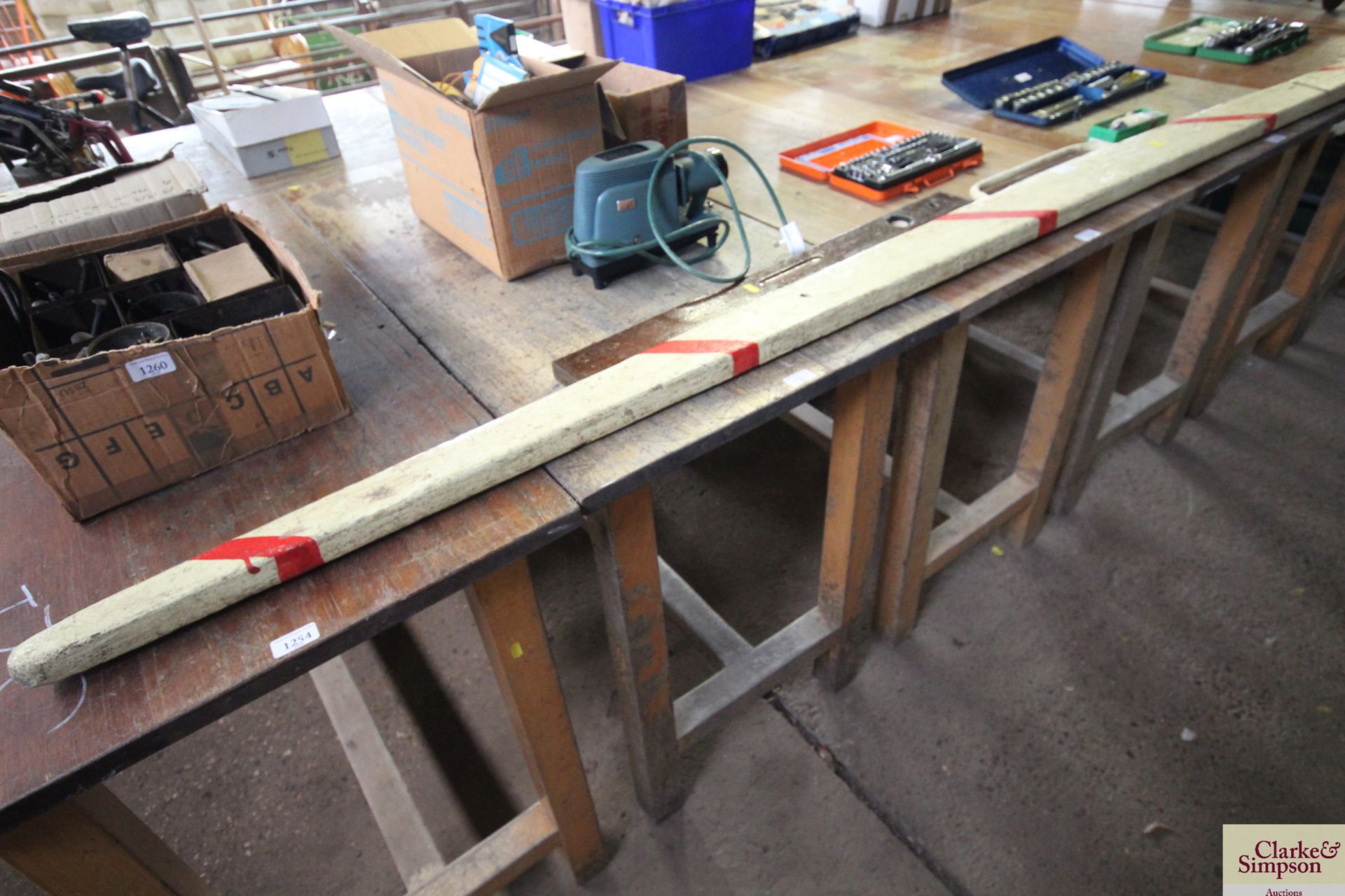 A wooden work bench measuring approx. 24" deep x 4
