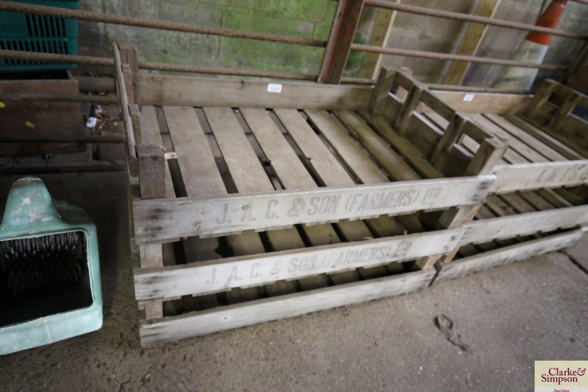 Three wooden apple crates