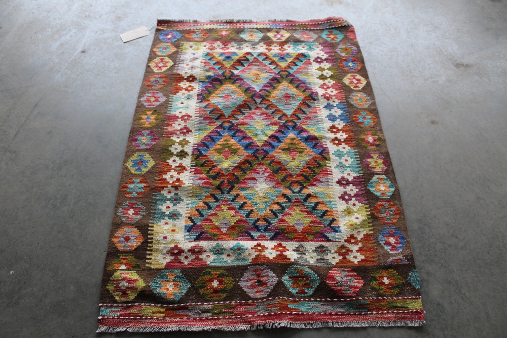 An approx. 5'1" x 3'4" Chobi Kelim rug