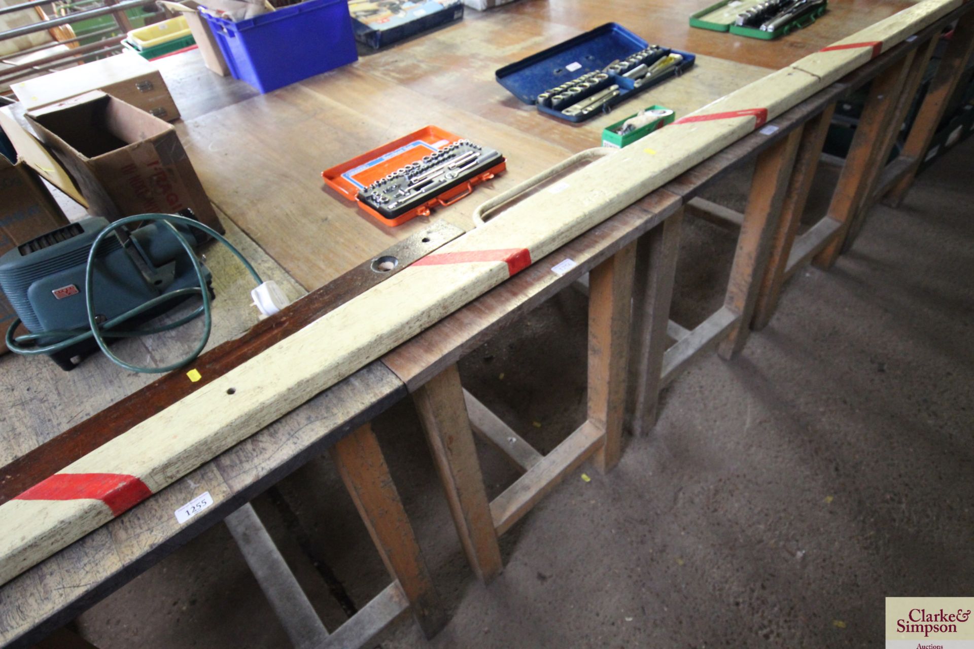 A wooden work bench measuring approx. 24" deep x 4