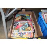 A box of books and DC comics