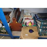 A magazine rack and a collection of various record