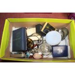 A box containing costume jewellery; perfume atomis