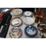 A quantity of collectors plates including Doulton