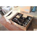 Two cardboard boxes containing various bolts; scre