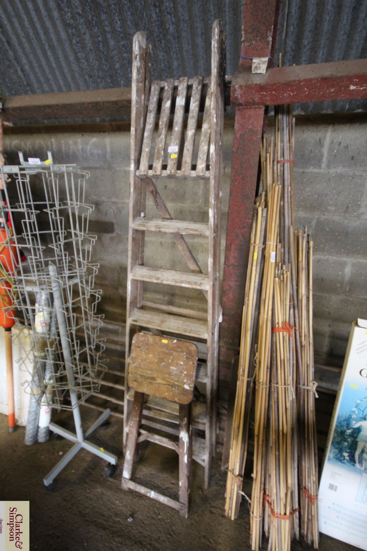 A large set of wooden folding steps together with