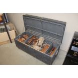 A wooden tool box and contents of various tools in