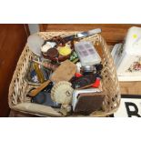 A wicker basket and contents of various sundries