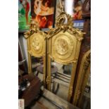 A pair of gilt framed bevel edge mirrors