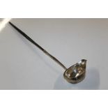 A silver toddy ladle