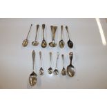 A bag of assorted silver teaspoons, condiments spo
