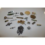 A box of jewellery including bar brooches and cost