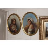 A pair of oval oil on panels depicting females, contained in gilt frames