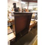 A mahogany open fronted bookcase with adjustable s