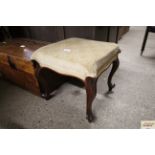 A Victorian upholstered stool