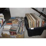 A box of various CD's and records