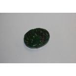 A jade coloured amulet