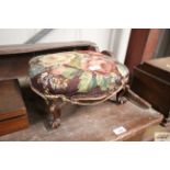 A Victorian walnut floral upholstered stool
