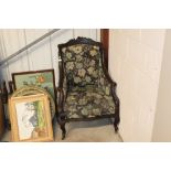 A Victorian wing back floral upholstered armchair
