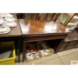 A 19th Century mahogany fold over tea table