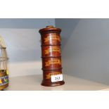 A wooden spice tower