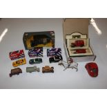 A box containing die-cast model vehicles including