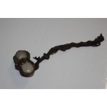 An Oriental bronze and jade coloured sceptre