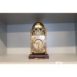 A brass lantern clock