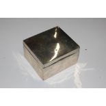 A silver cigarette box with wooden liner, 301gms t