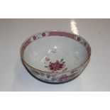 An Oriental Famille Rose decorated bowl