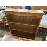 A pine open fronted bookcase