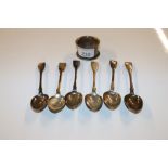 A silver napkin ring and six silver spoons, approx