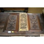 Three carved panels