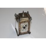 A Buren silver plated mantel clock bears inscripti