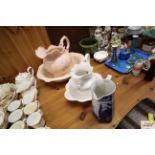 A floral decorated Staffordshire wash jug and bowl