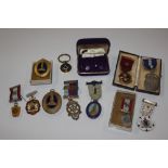 A box of masonic regalia to include silver and oth