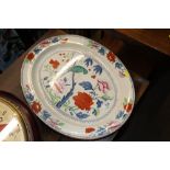 An oval Booth's meat plate with bird and floral de