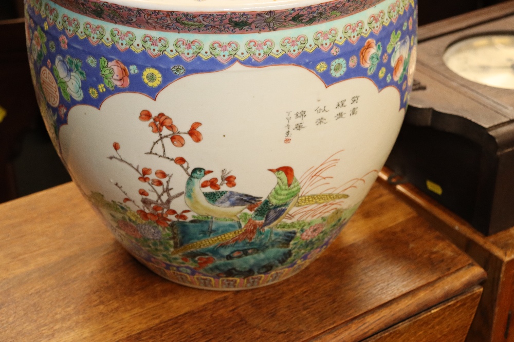 A large Chinese garden bowl with floral and bird d - Image 2 of 4