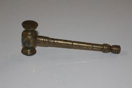 A brass gavel