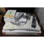 A Nintendo Wii games console with Wii fit board an