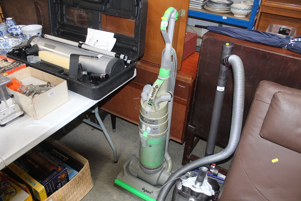 A Dyson DC04 upright vacuum cleaner